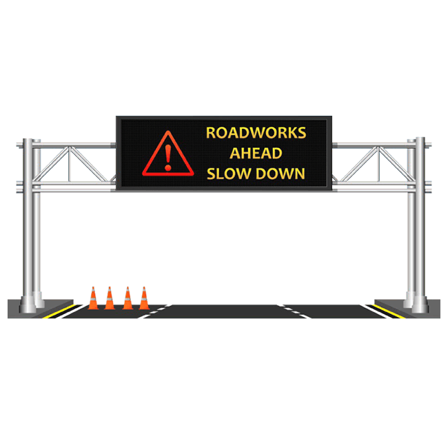 A variable message sign (VMS) installed on a highway gantry, displaying 'Road Under Construction, Slow Down' for traffic guidance