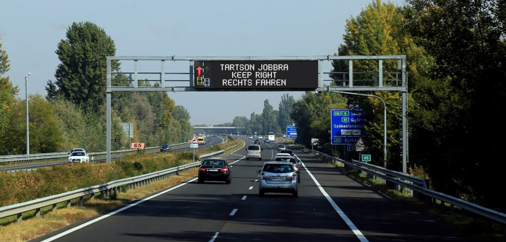 LED traffic display screen on highway gantry guiding drivers to choose the correct lane with high brightness and stable operation.