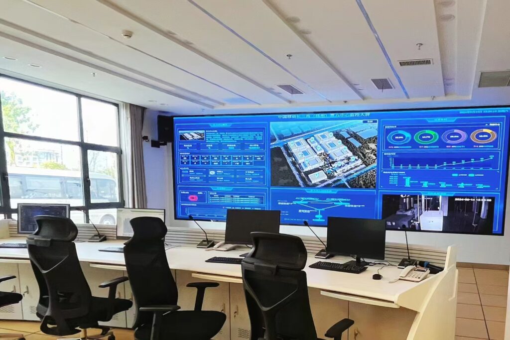 Large indoor LED display showcasing real-time equipment operation data at China Mobile's Yangtze River Delta (Yangzhou) Computing Power Center